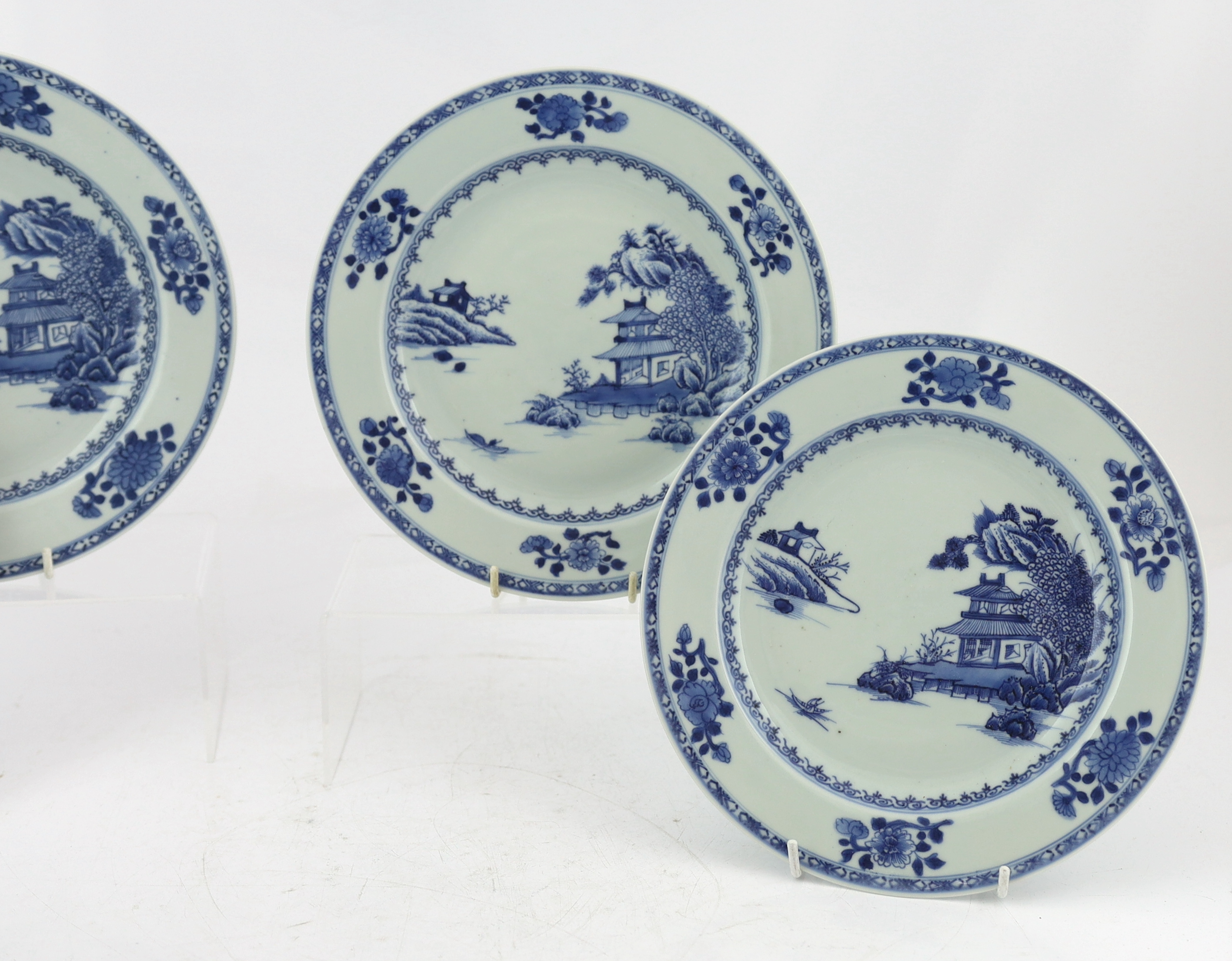 A set of twelve Chinese Nanking Cargo ‘Boatman’ blue and white plates, Qianlong period